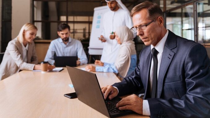 Multiethnic business team meeting in the office business setup in Dubai.